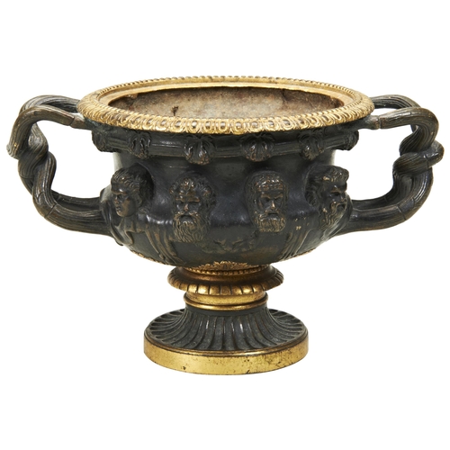 1837 - A 19TH CENTURY BRONZE WARWICK VASE. With gilded rim and base. 21cms total diam