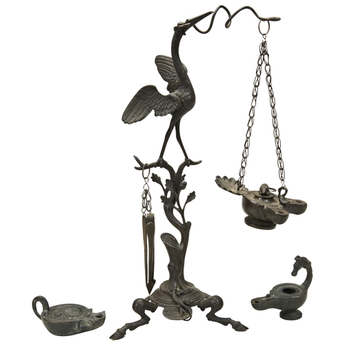 1841 - A 19TH CENTURY GRAND TOUR BRONZE COPY OF A ROMAN OIL LAMP WITH TOOLS. the tri-form stand in the form... 