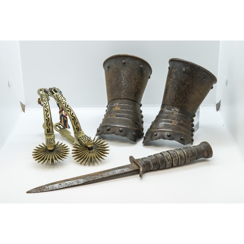 707 - A SMALL IRON CANNON BALL,  probably English Civil War, an ornate pair of brass stirrups, another pai... 