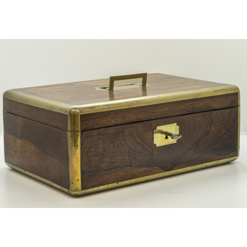 710 - A GOOD CAMPAIGN ROSEWOOD TOILET BOX the lid inscribed Lt. Colonel Knolly, 3rd Guards, the fitted int... 