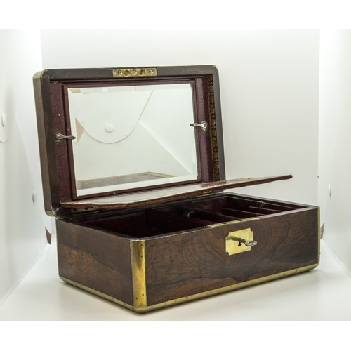 710 - A GOOD CAMPAIGN ROSEWOOD TOILET BOX the lid inscribed Lt. Colonel Knolly, 3rd Guards, the fitted int... 