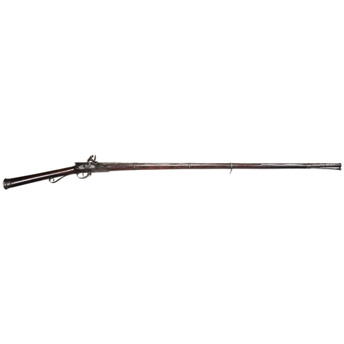 718 - AN INDIAN TORADAR, LATE 18TH CENTURY fitted with an unmarked English flintlock, with ram rod, some i... 