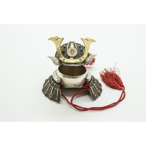 337 - A SILVER INKWELL MODELLED AS A JAPANESE KABUTO, intricately constructed.(lacking hinge pin) 4.5 cms ... 