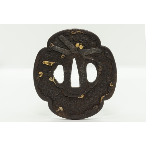 2227 - A JAPANESE IRON TSUBA beautifully decorated with butterfly in gold inlays and three other iron tsuba... 