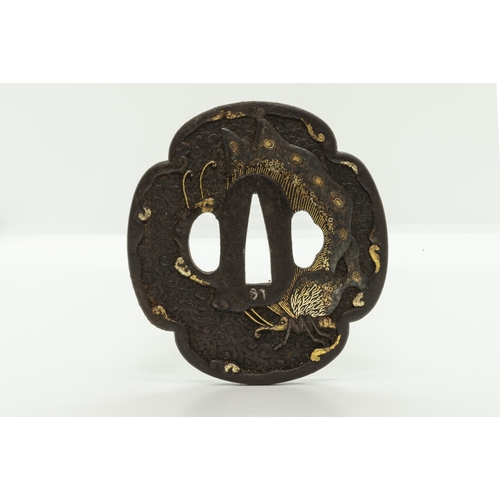 2227 - A JAPANESE IRON TSUBA beautifully decorated with butterfly in gold inlays and three other iron tsuba... 