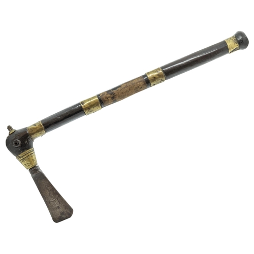 749 - A NORTH AMERICAN TOMAHAWK; TRADE BLADE AXE, the hardwood stock with brass bands. The ‘trade bl... 