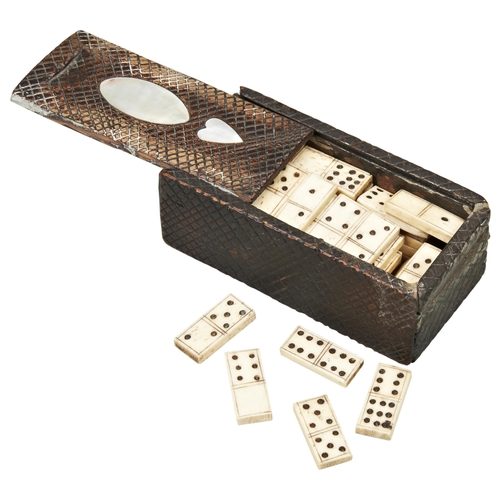 764 - A BONE DOMINO SET, probably Napoleonic Prisoner of War, in a wooden cross-hatched box with mother of... 