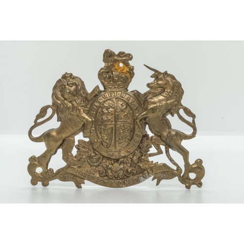 768 - A VICTORIAN OR'S MILITIA ARTILLERY HELMET PLATE, a Victorian ‘silver’ helmet plate and t... 