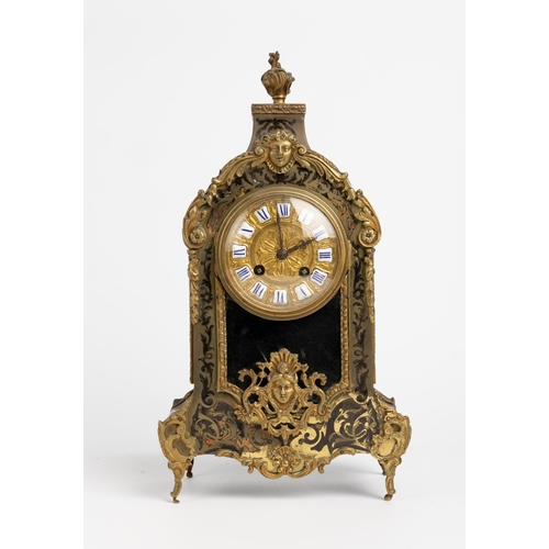 135 - A FRENCH BOULLE MATEL CLOCK. Movement by Japy Freres, sunburst pendulum, embossed gilt dial with ena... 