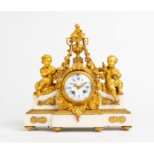 143 - A FRENCH WALNUT MARBLE AND ORMOLU MANTEL CLOCK. With enamel dial signed Raingo Freres, Paris in a br... 