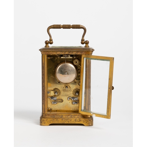 162 - A BELL STRIKING CARRIAGE CLOCK movement no. 1956, lower platform, in an engraved case.12cm