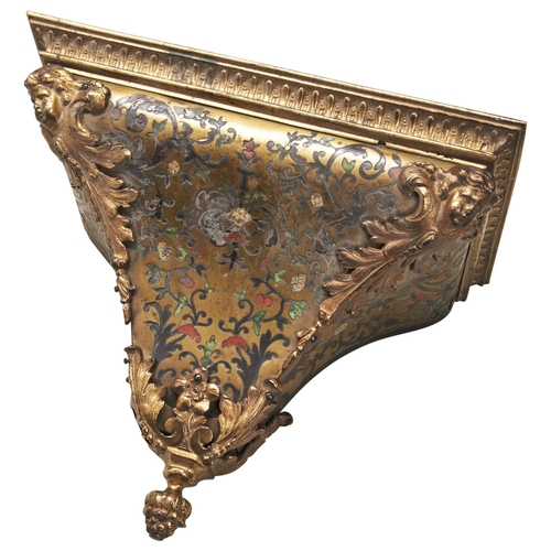 187 - AN 18TH CENTURY FRENCH BOULLE BRACKET flanked by masks, gilt bronze mounts. 28 x 24cm