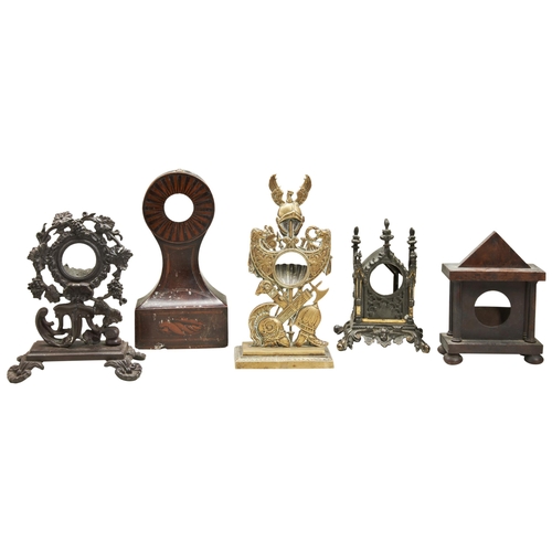 193 - FIVE WATCHSTANDS; one in gothic architectural case; one case iron with grapes; one in waisted inlaid... 