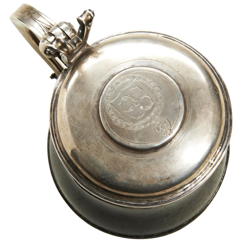 376 - A SILVER MOUNTED HARD STONE TANKARD The lid engraved with an armorial and order of St George Garter.... 