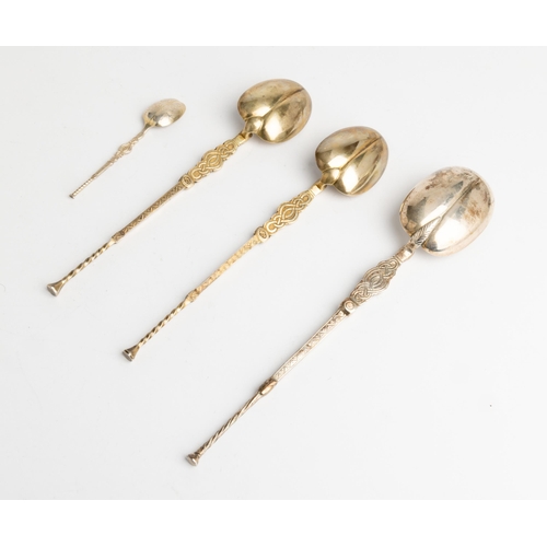 377 - FOUR SILVER-GILT REPRODUCTION ANOINTING SPOONS, C.190225.8 cm, 23 cm. & 11 cm.