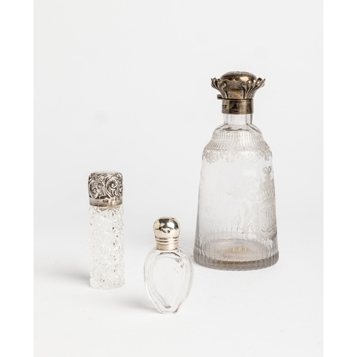 406 - A SILVER MOUNTED SCENT FLASK EMBOSSED WITH REYNOLDS ANGELS, LONDON 1904 Together with two smaller si... 