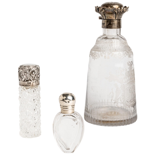 406 - A SILVER MOUNTED SCENT FLASK EMBOSSED WITH REYNOLDS ANGELS, LONDON 1904 Together with two smaller si... 