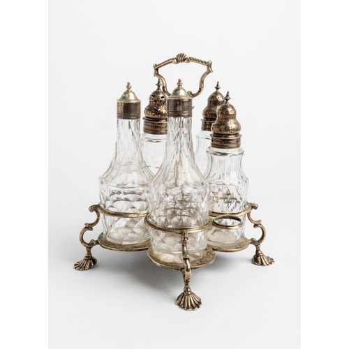 409 - A GEORGE III CRUET FRAME LONDON 1762 A silver cruet frame with five bottles.