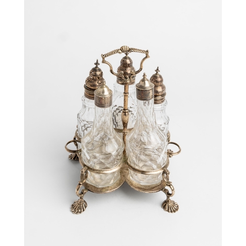 409 - A GEORGE III CRUET FRAME LONDON 1762 A silver cruet frame with five bottles.