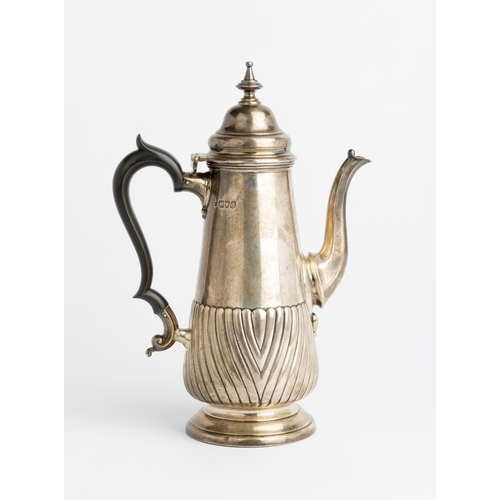 416 - A HALF FLUTED COFFEE POT, LONDON 1899 A Regency style coffee pot with a composite handle.26 cm.570 g... 