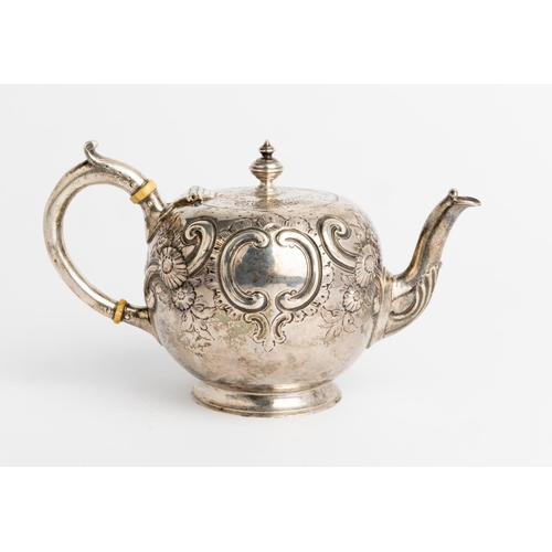 417 - A SMALL SPHERICAL VICTORIAN TEAPOT, LONDON 1872 Embossed with flowers and scrolls, with a silver han... 