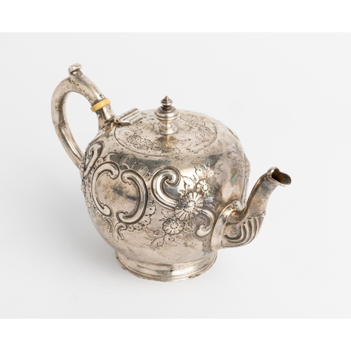 417 - A SMALL SPHERICAL VICTORIAN TEAPOT, LONDON 1872 Embossed with flowers and scrolls, with a silver han... 