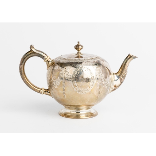 418 - A SMALL SPHERICAL VICTORIAN TEAPOT, LONDON 1867 With engraved swag decoration and a silver handle.17... 