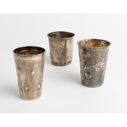 345 - A RUSSIAN BEAKER EMBOSSED WITH CHERRY SPRAY, MOSCOW C. 1900 Together with a plain French beaker and ... 