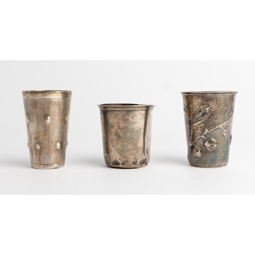 345 - A RUSSIAN BEAKER EMBOSSED WITH CHERRY SPRAY, MOSCOW C. 1900 Together with a plain French beaker and ... 