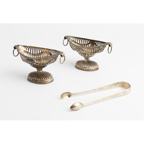 422 - A PAIR OF PIERCED NAVETTE SHAPED VICTORIAN SALTS, LONDON 1865 With embossed swags and ring handles. ... 