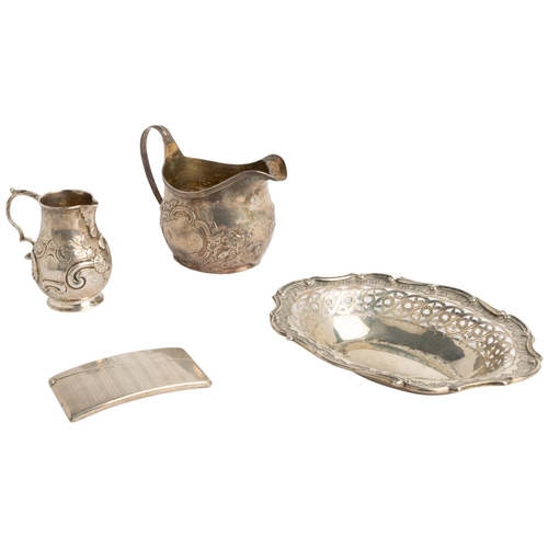 426 - A MIXED LOT INCLUDING A GEORGE II STYLE CREAM JUG Made in London in 1872 together with a larger oval... 