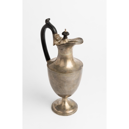 430 - AN URN SHAPED CLARET JUG, BIRMINGHAM 1899 A Plain jug with ebonised handle and knop.28 cm.430 g.... 