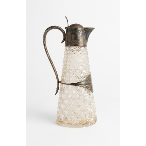 439 - A SILVER MOUNTED GLASS CLARET JUG, SHEFFIELD 1875 A hobnail cut glass jug with silver lid, handle an... 