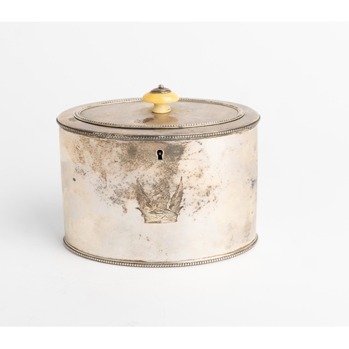 441 - A GEORGE III OVAL TEA CADDY, LONDON 1784 With a flat hinged lid and bead rims. Engraved to the body ... 