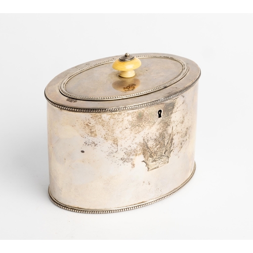 441 - A GEORGE III OVAL TEA CADDY, LONDON 1784 With a flat hinged lid and bead rims. Engraved to the body ... 