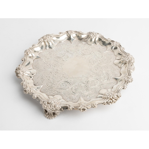 442 - A GEORGE IV FLAT CHASED SALVER, LONDON 1833 With a scroll and cast florate rim. 25 cm.521 g.... 