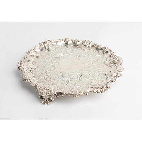 442 - A GEORGE IV FLAT CHASED SALVER, LONDON 1833 With a scroll and cast florate rim. 25 cm.521 g.... 