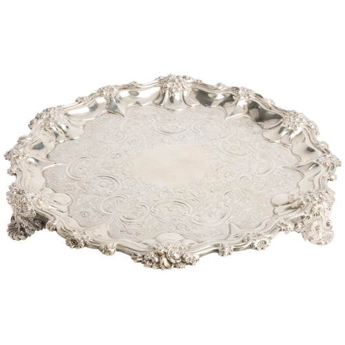 442 - A GEORGE IV FLAT CHASED SALVER, LONDON 1833 With a scroll and cast florate rim. 25 cm.521 g.... 