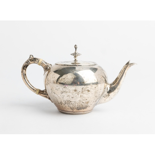 349 - A SMALL SPHERICAL DUTCH TEAPOT, C. 1860 With a silver handle and detachable finial.18 cm.246 g.Ivory... 