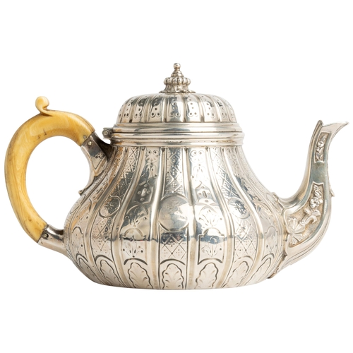 450 - A COMPRESSED BALUSTER SHAPE TEAPOT, LONDON 1843 With flat chased early 18th century style decoration... 