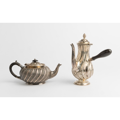 454 - AN SMALL OVAL FLUTED VICTORIAN TEAPOT, EDINBURGH 1887 Together with a French style side handled wryt... 