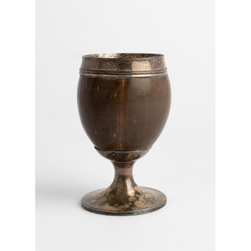 458 - A GEORGE III SILVER MOUNTED COCONUT CUP, LONDON 1830.13.5 cm.