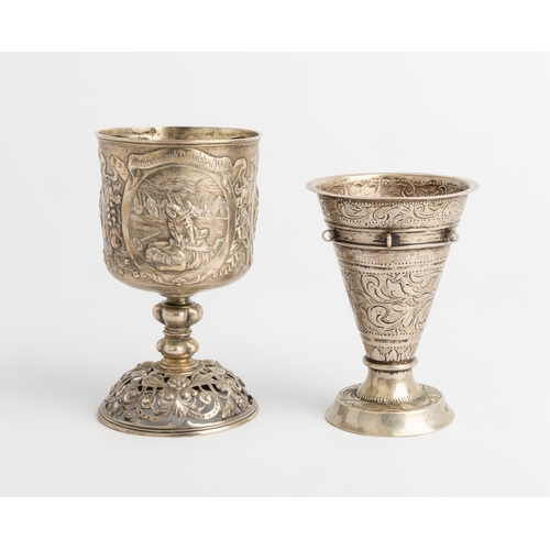 355 - A GERMAN EMBOSSED GOBLET AND A SCANDINAVIAN BEAKER, C.1870 The German goblet with pierced base, mark... 