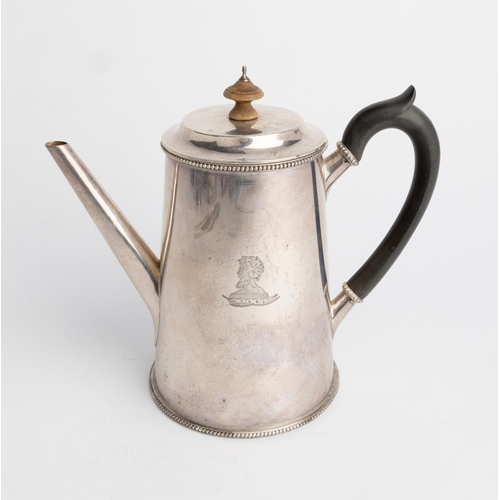 462 - A PLAIN TAPERING COFFEE POT, LONDON 1885 With bead rims, engraved to the body with a crest.18 cm.422... 