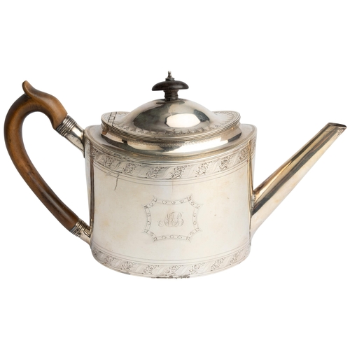 463 - A LARGE OVAL TEAPOT, LONDON 1793 Engraved with bands of decoration and escutcheons on both sides.29 ... 