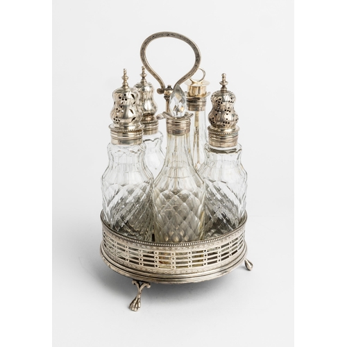 468 - A GEORGE III FIVE BOTTLE CRUET FRAME, LONDON 1777 A pierced frame on three paw feet.24 cm.... 