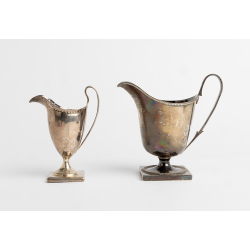 482 - A LARGE GEORGE III HELMET SHAPE CREAM JUG, LONDON 1801 Together with another helmet shape jug, Londo... 