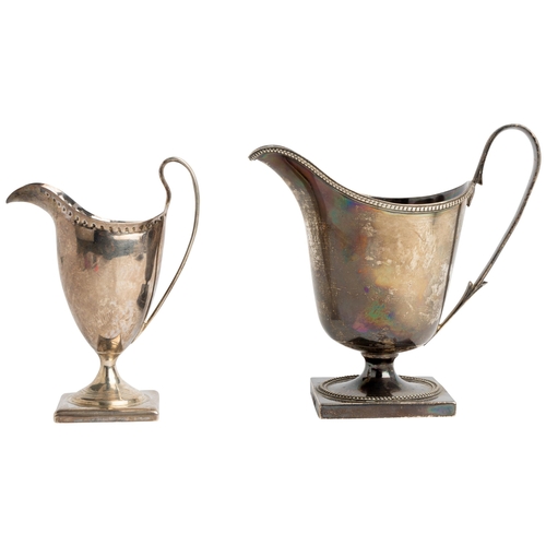 482 - A LARGE GEORGE III HELMET SHAPE CREAM JUG, LONDON 1801 Together with another helmet shape jug, Londo... 