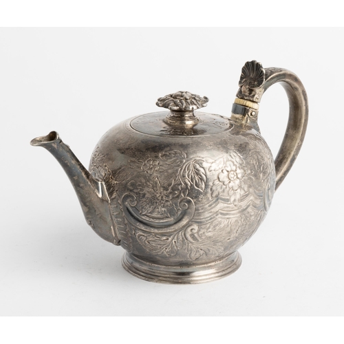 484 - A FLAT CHASED BULLET TEAPOT, LONDON 1729 With a cast florate detachable knop.18.5 cm.Ivory Exemption... 