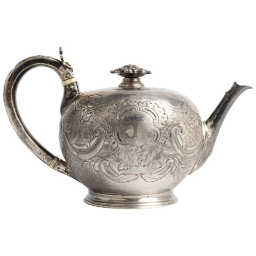 484 - A FLAT CHASED BULLET TEAPOT, LONDON 1729 With a cast florate detachable knop.18.5 cm.Ivory Exemption... 